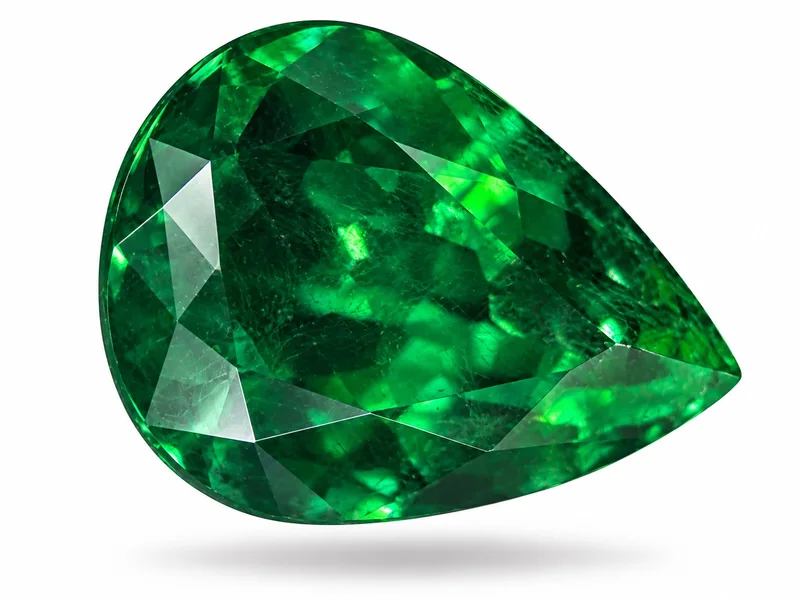 A luminous green pear-shaped gemstone